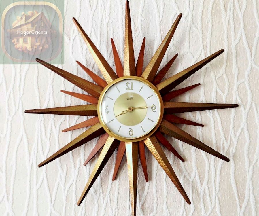 reloj de pared con diseño de sol de los años 70
